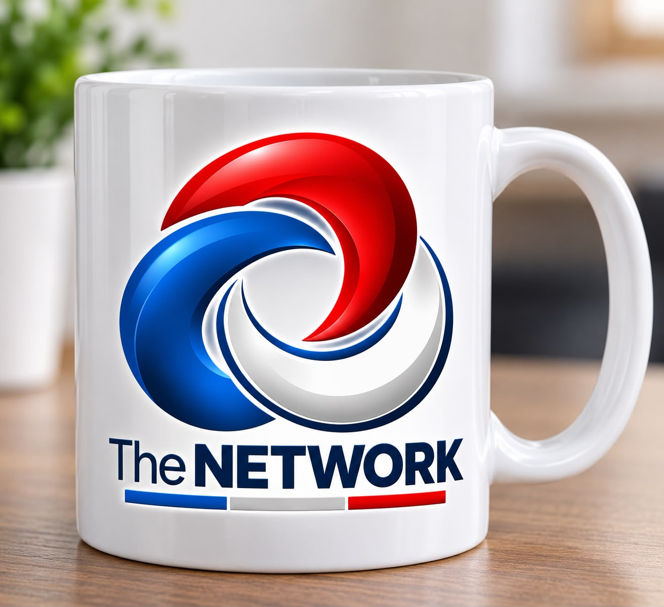 White ceramic mug printed with The Network logo